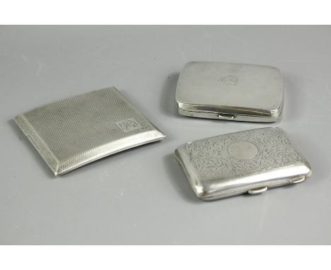 Three silver cigarette cases, the first Birmingham hallmark, dated 1928, mm WES; the second Birmingham hallmark, dated 1926 m