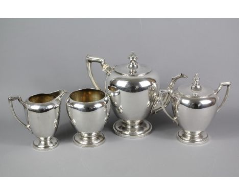 Reed &amp; Barton sterling silver four piece tea set; including tea pot, lidded sugar bowl, milk jug and tea leaf bowl approx