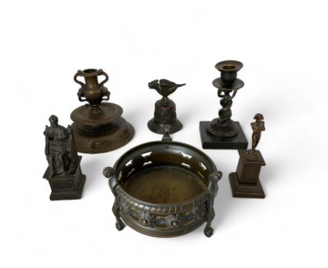 A collection of six small patinated bronzes
Comprising of a seated Saint Peter giving his blessing, 14cm high, Napoleon on a 