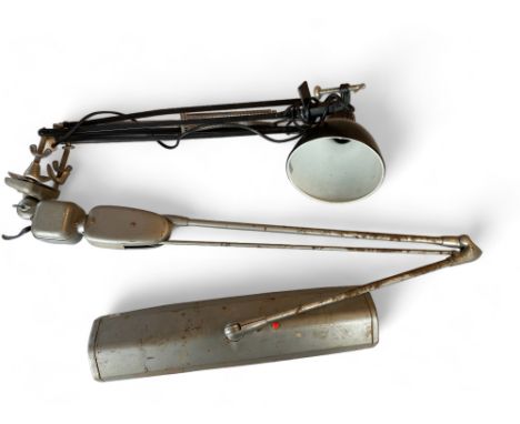 A vintage industrial aluminium clamping strip light and a Luxo black metal clamping machinist lamp
(2)

