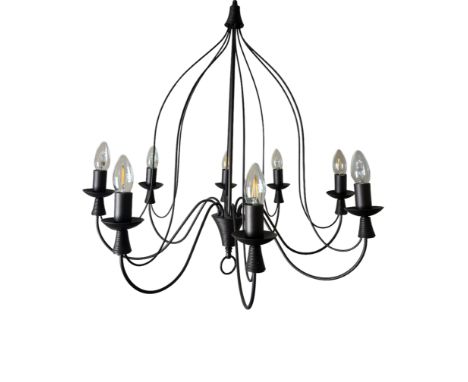 A contemporary black painted eight branch chandelier
Fitted for electricity, 82cm drop.