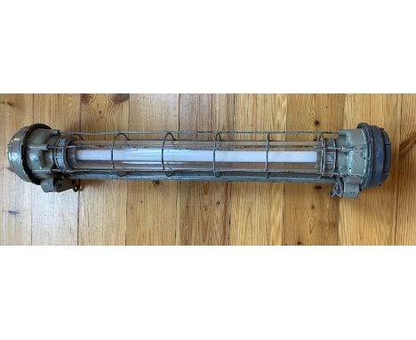 A large vintage Ukrainian industrial aluminium explosion proof strip light
85cm wide