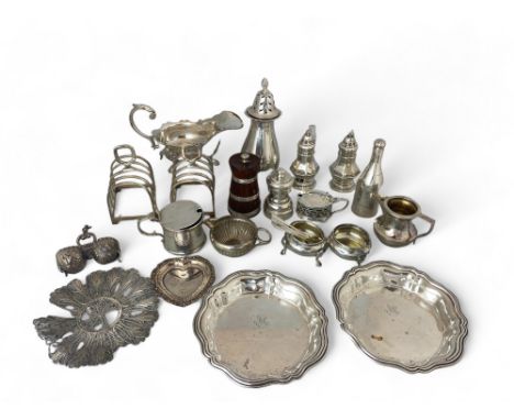 A group of silver and silver plated items
Comprising of a filigree basket, (a.f), a heart shaped silver dish, A Chick &amp; S
