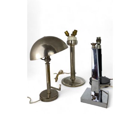 A group of four 20th century table lamps
Three chrome, one ebonised and chrome, including an Art Deco triple light lamp, anot
