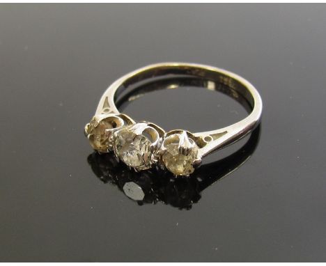 A white gold diamond three stone ring .80ct total approx, stamped 18ct. Plat. Size K/L, 2.4g