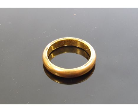 A 22ct gold wedding band, 3mm wide, Birmingham 1848. Size J/K, 6.2g