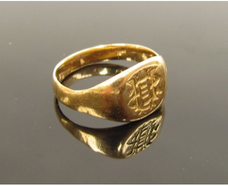 A gents gold signet ring, monogrammed, slightly miss-shapen, stamped 18ct. Size R/S, 5.1g