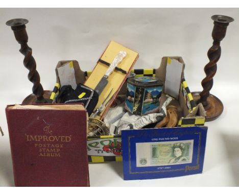 A BOX OF COLLECTABLES TO INCLUDE A VINTAGE STAMP ALBUM, NUT CRACKER, CIGARETTE CARDS ETC