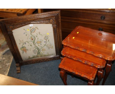 AN OAK FRAMED EMBROIDERED FIRE SCREEN H- 78CM PLUS A YEW NEST OF TABLES