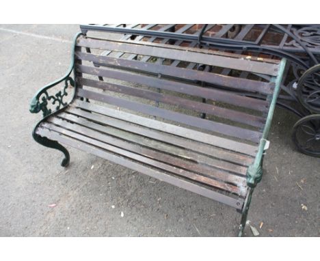 A GARDEN BENCH WITH CAST ENDS A/F