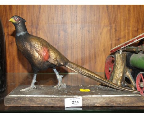 A VINTAGE PHEASANT SHAPED TABLE LIGHTER 