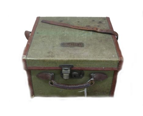 A vintage leather bound green canvas cartridge case, first half 20th century, the hinged cover enclosing a lift-out divided t