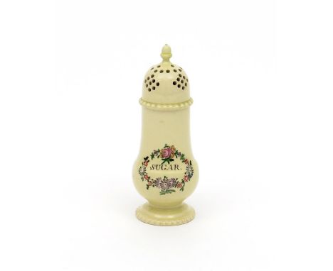 A creamware sugar caster, c.1770, painted in polychrome enamels with an oval panel of flowers encircling the word 'Sugar', th