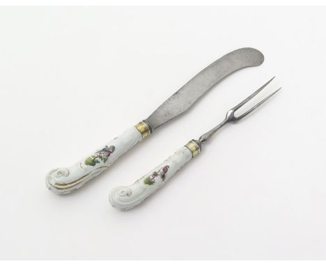 A knife and fork with Chelsea porcelain handles, c.1760, with scroll moulded pistol hafts, painted with panels of exotic bird