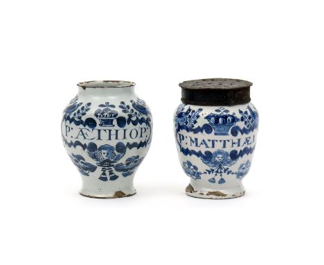 Two small delftware dry jug or pill jars, 1st half 18th century, painted in blue with two birds flanking a basket of fruit ab