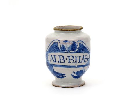 An early small delftware dry drug or pill jar, c.1680, painted in blue with an angel with outstretched wings above a banner i