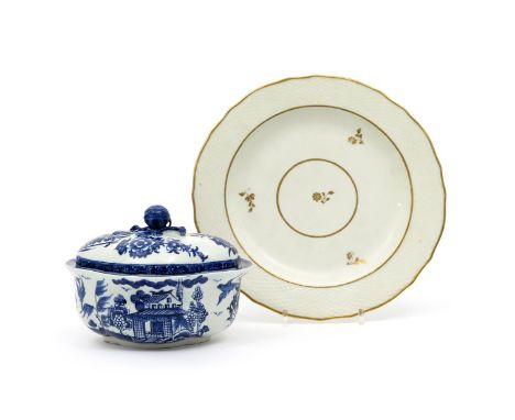 A Derby blue and white sauce tureen and cover, c.1765, the quatre-lobed form painted with birds in flight around Chinese buil