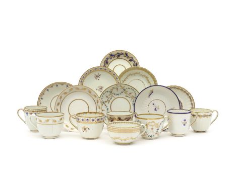 Nine Derby cups and saucers, c.1790-1820, including coffee and tea cups, decorated with cornflower sprigs, gilt flower garlan