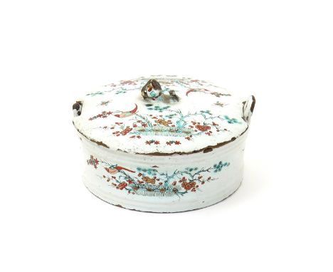 A Delft doré buttertub and cover, c.1740, the circular form painted in green, black, red and gilt with birds perched on bambo