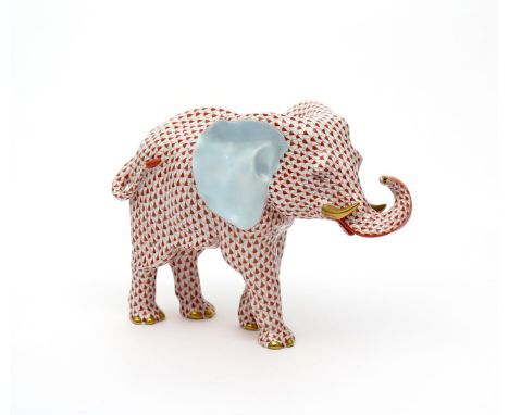 A large Herend model of an elephant, modern, standing with his trunk raised and curled, his coat typically decorated in a den