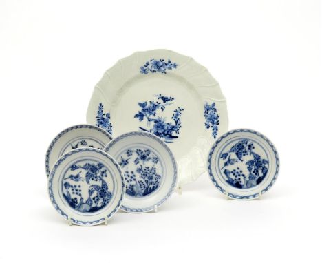 Four German porcelain saucers, mid 18th century, two Meissen and two Vienna, painted in underglaze blue with the Fels und Vog