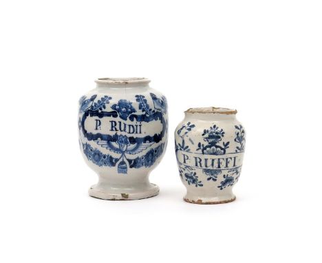 Two delftware dry drug or pill jars in two sizes, 1st half 18th century, painted in blue with birds among branches flanking a
