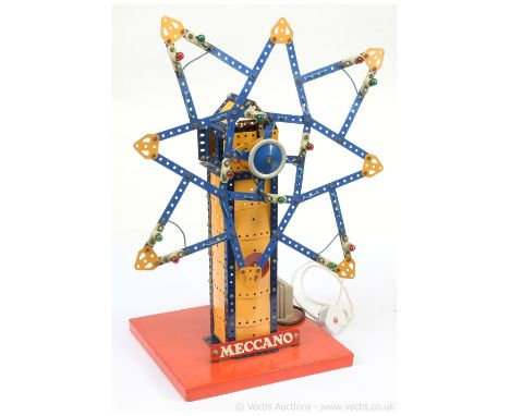 Meccano factory built working display model of a Rotating Star Wheel. Built using late issue dark blue and yellow parts and i