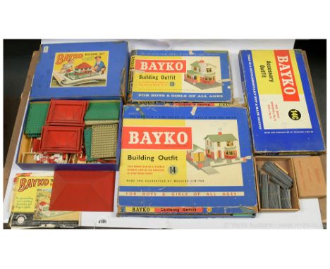 Bayko quantity of Outfits including 13, 14, 14C with a number of bricks, windows, doors, bases, steps, varying colours cream,