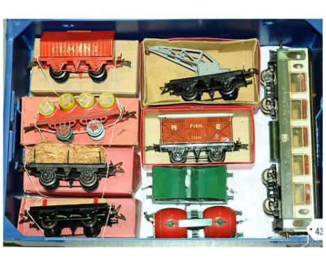 Hornby O Gauge group of post-war Goods and Passenger Rolling Stock consisting of a Cement Wagon, Barrel Wagon, Fibre Wagon, N