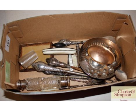 A silver topped double ended scent bottle, various silver handled button hooks etc.