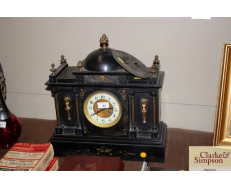A large Victorian marble and gilt metal mounted mantel clock of architectural design