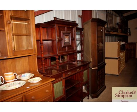 A late 19th Century Gillow &amp; Co. walnut chiffonier with raised back shelves and ivory inlaid decoration, stamped No.1749