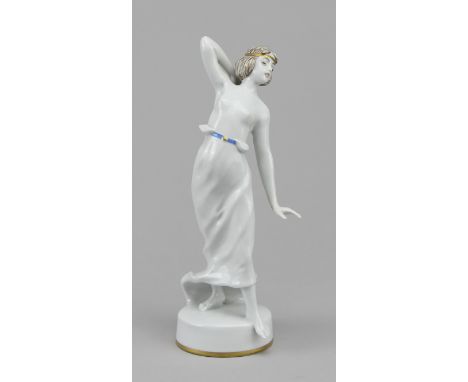 Rosenthal - Figur "Ionische Tänzerin"Porzellan farbig staffiert und goldbemalt, im Ausfallschritt stehende Tänzerin mit erhob