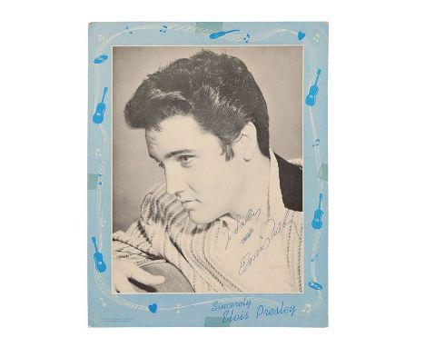 ELVIS PRESLEY - Autographed PhotographAn autographed photograph of Elvis Presley from the 1960 musical comedy G.I. Blues. The