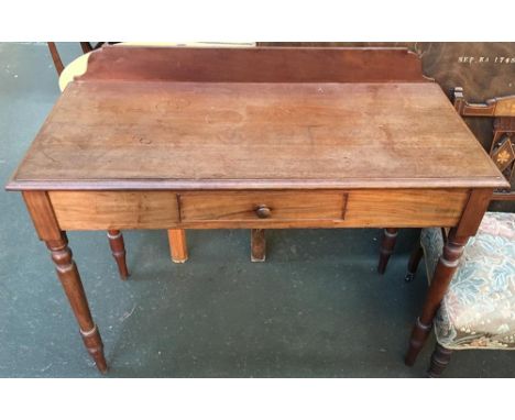 A mahogany side table with single cockbeaded frieze drawer, on turned legs, 106x75cmH 