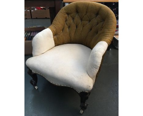 A small button back armchair, serpentine front, raised on outward scrolling cabriole legs with ceramic casters, loose cover i