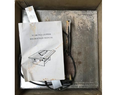 A TC180 tile cutter, in original box 