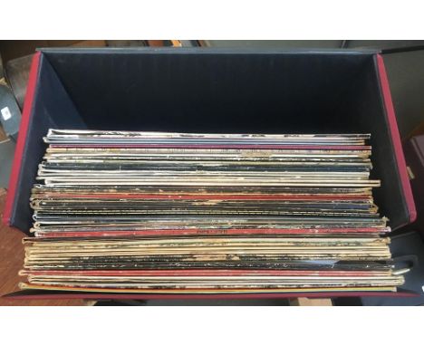 A box of 30 records to include The Beatles, David Bowie, Bob Dylan, Led Zeppelin, Pink Floyd, etc 