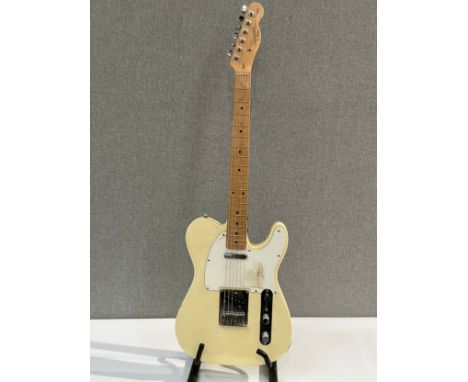 A Fender Squier Tele (Telecaster) electric guitar, made in China, cream body, serial number CY121202771 