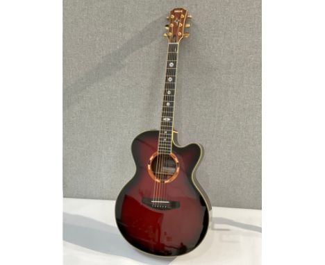 A Yamaha Compass Series CPX-15WA electro acoustic guitar, redburst body, inlaid sound hole surround, serial no. QJK039A, with