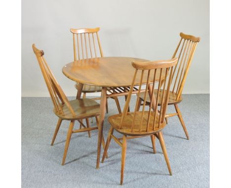 An Ercol light elm circular dining table, 98cm, together with a set of four matching dining chairs 