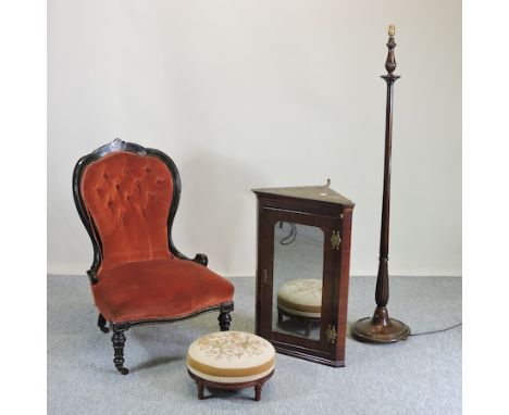 A Victorian red upholstered button back nursing chair, together with a circular footstool, a hanging corner cabinet and a sta
