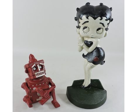 A red painted metal robot money box, together with a Betty Boop doorstop, 32cm tall