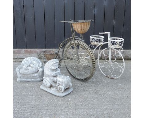 A wire framed garden planter in the form of a bike, 70cm long, together with another smaller and two garden models of animals