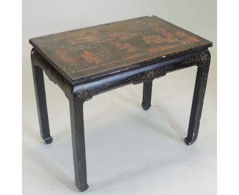 An early 20th century Chinese lacquered table, decorated with figures, 77cm