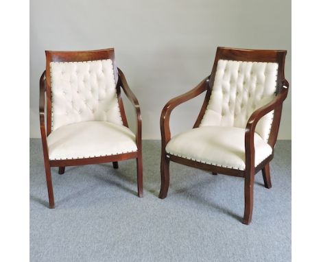 A pair of Empire style hardwood and cream upholstered button back armchairs