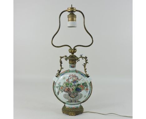 A Chinese porcelain vase, converted to a gilt metal mounted table lamp, 46cm tall