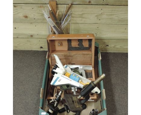 An early 20th century microscope, by F. E. Becker & Co, together with two smaller, a collection of mercury thermometers, a wo