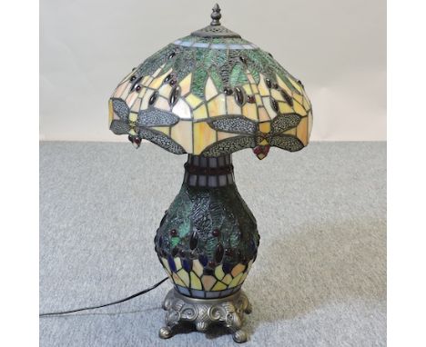 A Tiffany style leaded glass table lamp and shade, 54cm tall