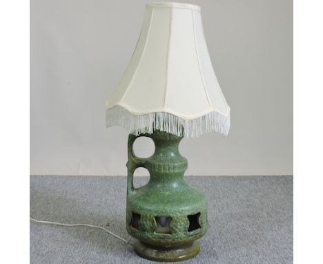 A 1960's green stoneware table lamp and shade, 82cm tall